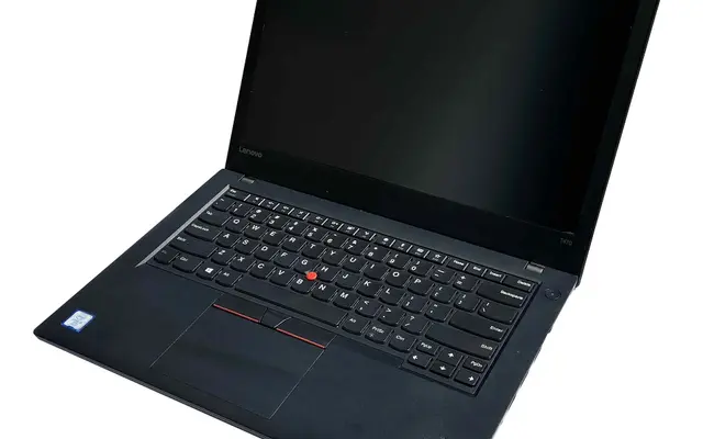 Black Lenovo ThinkPad T470 laptop open with a dark screen