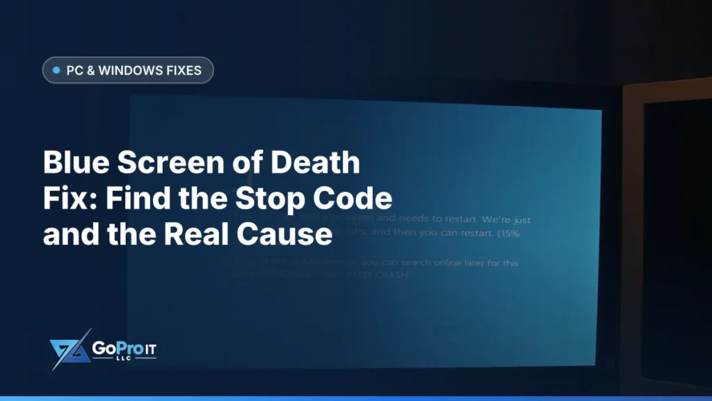 Monitor displaying a Windows blue screen of death with sad face