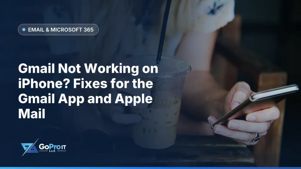 Hands holding a smartphone beside an iced coffee on a table